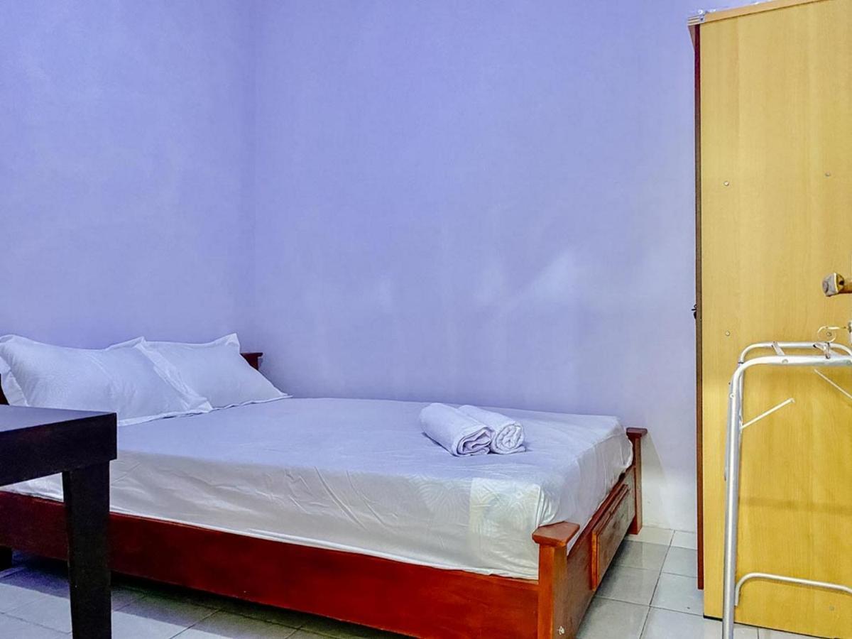 Hotel Griya Asri Syariah Mitra Reddoorz Rogojampi Esterno foto